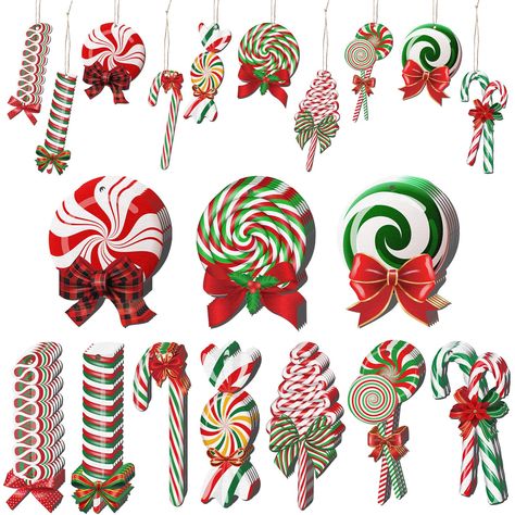 Hard Candy Christmas Decorations, Candy Cane Christmas Wreath, Candyland Decorations Christmas, Red And Green Christmas Tree Decorations, Extreme Christmas Decorations, Diy Christmas Candy Decorations, Christmas Archway Decor Indoor, Grinch Themed Christmas Tree, Candy Themed Christmas Decor