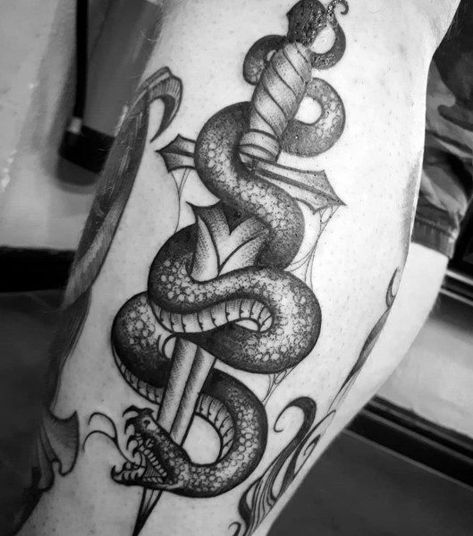 50 Snake Dagger Tattoo Ideas For Men - Sharp Serpent Designs Snake Dagger Tattoo, Dagger Tattoo Ideas, Xoil Tattoos, Snake And Dagger Tattoo, Around Arm Tattoo, Serpent Tattoo, Art Flash, Knife Tattoo, Geometric Tattoo Arm