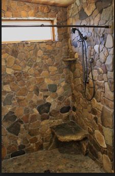 Marble Tile Bathroom Wall, Rock Bathroom Ideas, Cabin Shower Ideas, Rustic Showers, Stone Shower Walls, Rustic Bathroom Shower, Rock Shower, Metal Building Designs, Marble Tile Bathroom