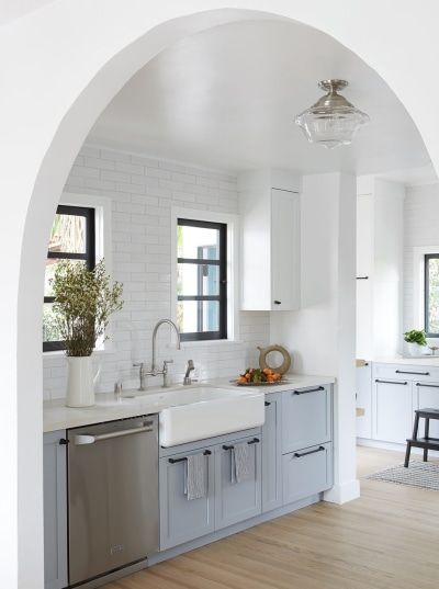 We love this on-trend arch-shaped doorway, adding interest to a simple kitchen Spanish Colonial Homes, Farmhouse Kitchen Remodel, Hm Home, Kitchen Remodel Before And After, Vintage California, Diy Kitchen Cabinets, Flipping Houses, Modern Farmhouse Kitchens, Spanish Colonial