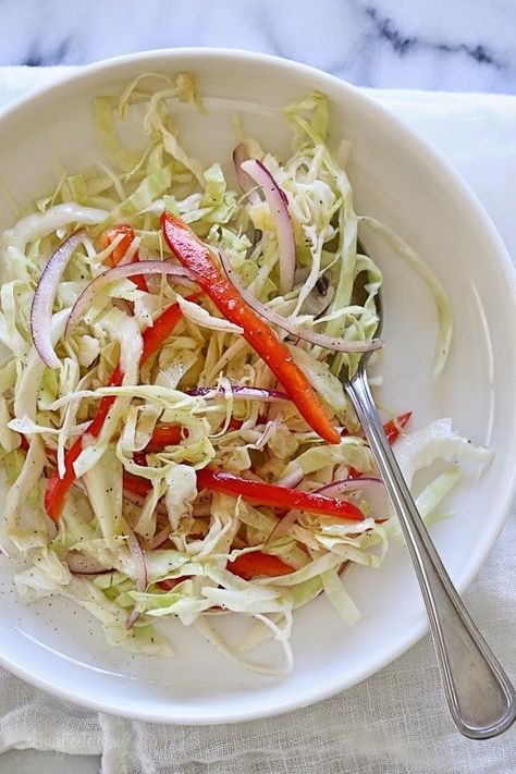 This quick, simple slaw is a staple in my house. Perfect when you need something acidic to balance a savory dish. Everyone loves this, including my toddler only for her I leave out the red onion. It's also low-carb, vegetarian, gluten-free and whole30 compliant. Quick Healthy Side Dishes, Slaw Recipe, Cabbage Slaw, Skinny Taste Recipes, Food Tasting, Quick Healthy, Healthy Side Dishes, Whole 30 Recipes, Coleslaw