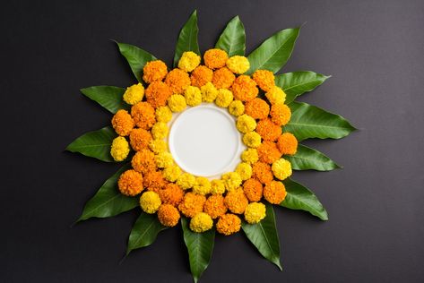 Simple and Sustainable Diwali Rangoli Ideas Leaves Rangoli, Pellikuthuru Decoration, Puja Decoration, Ganpati Decor, Mango Leaves, Flowers Rangoli, Haldi Decoration, Flower Balls, Rangoli Designs Photos