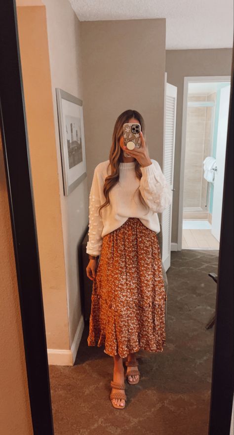 Floral Skirt Sweater Outfit, Floral Flowy Skirt Outfit, Winter Fashion Outfits Medium Size, Women’s Skirt And Sweater Outfit, Maxi Skirt Outfit With Sweater, Sweater Over Floral Dress, Dress And Sweater Outfit Spring, Flowy Skirt And Sweater Outfit, Sweater And Skirt Outfit Spring