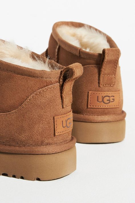 UGG® Classic Ultra Mini Boots | Anthropologie Tiny Ugg Boots, Low Rise Uggs, Ugh Ultra Mini, Ugh Mini, Uggs Classic Mini, Preppy Christmas Outfit, Nike Winter Jackets, Platform Uggs, Ultra Mini Uggs