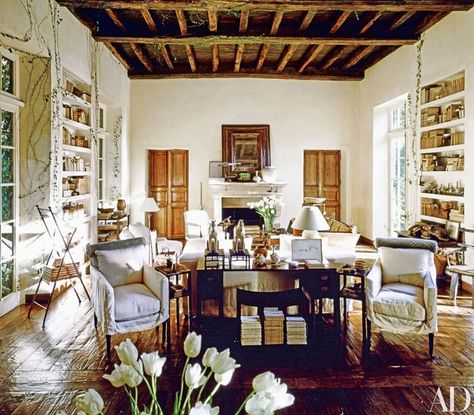 In a June 1991 article on her home in Southern California, Rose Tarlow said, “I was trying to prove to myself that you can create an ageless house.” Decades later, the living room stands the test of time, with its signature design elements, including ceiling crossbeams from an 11th-century English church, 18th-century French doors, and floors of 17th-century oak. Rose Tarlow Interiors, Living Room Stands, Rose Tarlow, Home Design Ideas, French Doors Interior, White Rooms, Nursing Home, French House, Architectural Digest