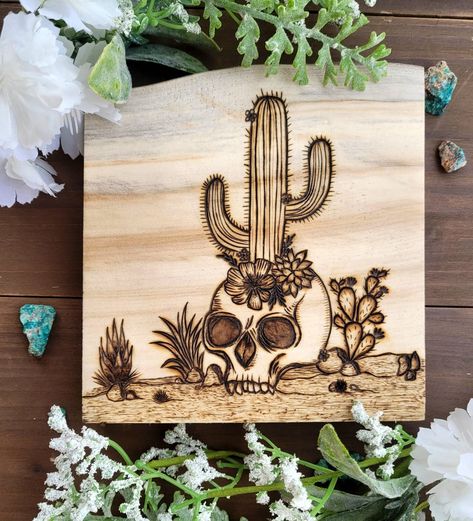 Wood burned piece featuring hand drawn skull with cactus and flowers on Aspen wood from Colorado. . . . 6.5 in by 6 in Cactus And Flowers, Burning Flowers, Drawn Skull, Wood Burned Signs, Easy Minecraft Houses, Aspen Wood, Wood Burning Art, Desert Landscape, Desert Landscaping