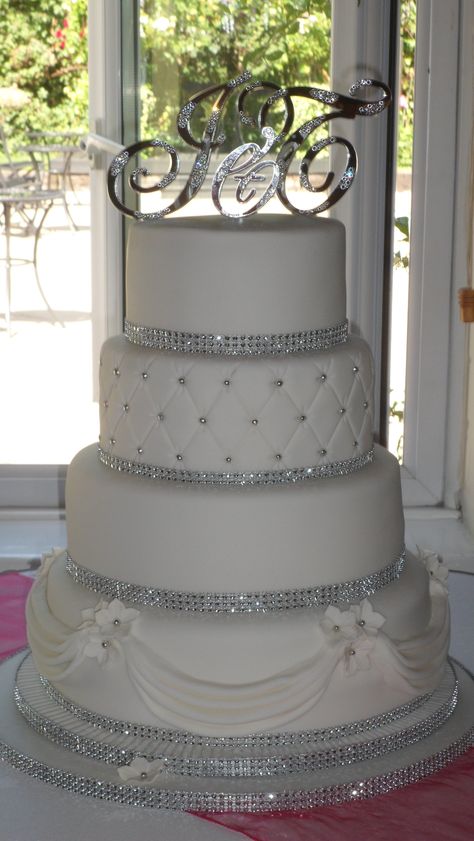 Swags and diamante wedding cake :) Wedding Cake With Diamonds, Sparkling Wedding Cake, 25 Wedding Anniversary Cakes, Diamond Cake Ideas, Diamond Wedding Anniversary Cake Ideas, Wedding Cake With Rhinestones, Wedding Cake Bling Diamonds, Wedding Cake Glitter Sparkle, Wedding Cake Diamond