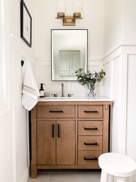 I’m so excited to be revealing this bathroom to you all today! This bathroom has been a work in progress since we moved into this home 11 years ago and I am thrilled to finally complete this space. We spent a fair amount of time over the past 10 years thinking about what […] Small Bathroom Renovation, Oak Bathroom, Small Bathroom Vanities, Smart Home Design, Brown Bathroom, Bathroom Solutions, Downstairs Bathroom, Basement Bathroom, Upstairs Bathrooms