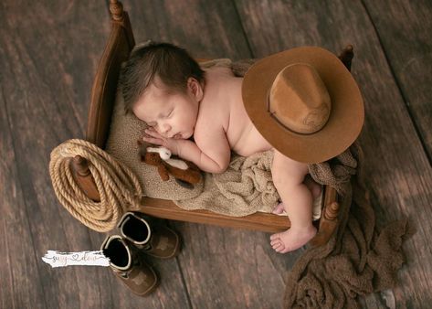 Newborn cowboy photoshoot #babyphotography #newbornphotography #babycowboy Cowboy Themed Newborn Pictures, 3 Month Old Cowboy Pictures, Cowboy Newborn Photos, Newborn Cowboy Photoshoot, Cowboy Milestone Pictures, Mexican Newborn Photoshoot, Baby Boy Cowboy Photoshoot, Newborn Cowboy Photography, Cowboy Newborn Photography