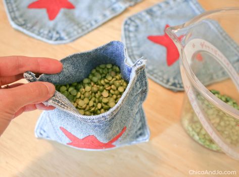 Make a bean bag toss game | Chica and Jo How To Make A Bean Bag, How To Make Beans, Recycling Jeans, Diy Bean Bag, Jeans Recycling, Bag From Old Jeans, Bean Bag Games, Bean Bag Toss Game, Bag Toss Game