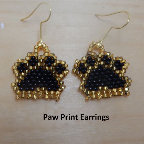 Paw Print Earrings.  Black and gold seed beads woven into paw prints. Hand made. Birthday, Christmas, friendship gifts. Paw Earrings, Paw Print Earrings, Beading Ideas, River Rock, Earrings Black, Paw Prints, Gorgeous Bracelet, Beautiful Hats, Friendship Gifts