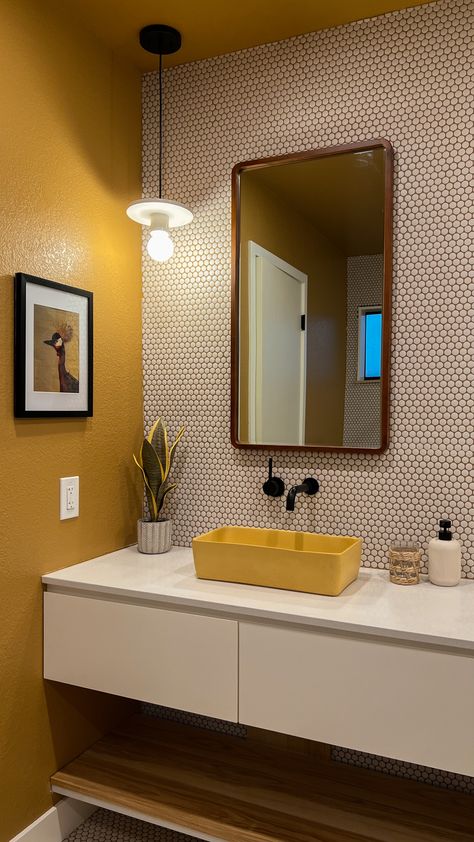 warm and moody ochre bathroom design with yellow ceiling, floating vanity, white penny tile and concrete sinks Black White Mustard Bathroom, Neutral Bathroom Pop Of Color, Yellow Tiled Bathrooms Ideas, Yellow And White Bathroom Decor, Mustard Yellow Bathroom Vanity, Yellow Ceiling Bathroom, Mustard Yellow Ceiling, Terrazo Bathroom Counter, Yellow Bathrooms Ideas