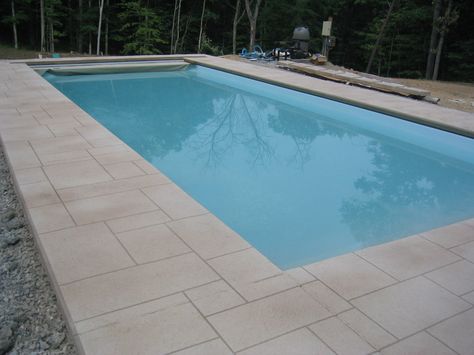 Stamped concrete is an ideal pool deck surface, combining the attributes of beauty, durability, and low maintenance with the vast array of decorative options not possible with other pool deck materials. Stamped Concrete Pool Deck, Pool Deck Ideas Inground, Stamped Concrete Pool, Cement Pools, Concrete Pool Deck, Inground Pool Landscaping, Pool Pavers, Concrete Deck, Swimming Pool Decks