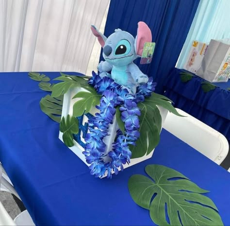 Lilo And Stitch Quinceanera Theme, Diy Stitch Centerpieces, Lilo And Stitch Centerpiece Ideas, Lilo And Stitch Table Centerpiece, Stitch Table Decorations, Stitch Centerpiece Ideas Diy, Lilo And Stitch Table Decorations, Stitch And Angel Centerpiece Ideas, Stitch Baby Shower Centerpieces