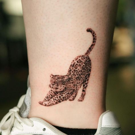 21 Gorgeous Ankle Tattoos To Show Off This Summer Cool Ankle Tattoos, Butterfly Ankle Tattoos, Cute Ankle Tattoos, Leopard Tattoo, Leopard Tattoos, Timeless Tattoo, Ankle Tattoo Designs, Leopard Watercolor, Ankle Tattoos