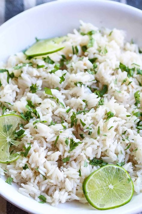 coconut ginger rice in a bowl and topped with limes and cilantro Coconut Ginger Rice, Ginger Rice Recipe, Ginger Rice, Rice Recipes Vegan, Coconut Ginger, Vegan Rice, Rice Recipes For Dinner, Rice Dinner, Ginger Recipes