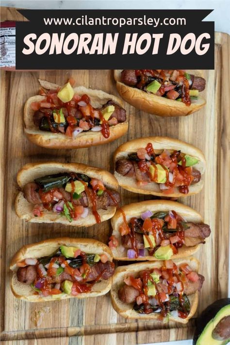 This Sonoran Hot Dog Recipe is made by wrapping each hot dog with bacon, baking them, and topping each hot dog with jalapeños and pico. Sonoran Hot Dog Recipe, Hod Dog, Mexican Hot Dogs, Sonoran Hot Dog, Hot Dog Recipe, Bacon Wrapped Hotdogs, Cilantro Parsley, Egg Burger, Mexican Crema