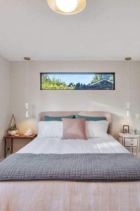 The guest bedroom remodel includes a new clerestory window above the bed, pendant lights beside the bed, carpet, and paint. Bed Pendant Lights, Primary Suite Addition, Window Above Bed, Loft Dormer, Bed Carpet, Above Bed Ideas, Guest Bedroom Remodel, Guest Bedroom Design, Primary Suite