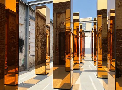 UVA's rotating gold columns immerse A/D/O, the creative space by MINI, with light, shadow and reflection Mirror Maze, Mirror Installation, Pillar Design, Column Design, Light Shadow, Decoration Inspiration, Brand Building, London Design, Art Deco Design