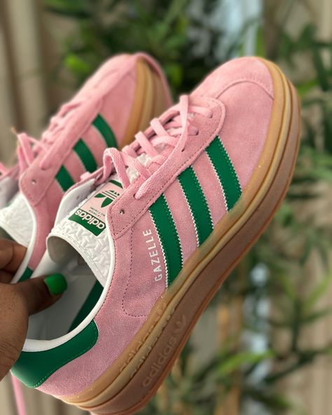 You have to hurry before they sell out like the red Gazelle😩 These are bold and vibrant - exactly what you need to make your outfit pop in summer. Love the pink and green combo. So unusually beautiful 💚💗 These are women’s sizing. I wear size 42 so I bought a size US 10 which is a size 42 2/3 in Adidas. Long story short, BUY YOUR TRUE SIZE! Sneakers are linked in bio. Comment “SHOP” if you want to receive info to your DM. #adidasgazelle #adidassneakers #sneakerspics #adidaslover Adidas Giselle Shoes, Green And Pink Shoes, Gazzels Shoes, Pink And Green Shoes, Gazelles Adidas, Red Gazelle, Adidas Gazelle Green, Adidas Gazelle Shoes, Adidas Gazelles