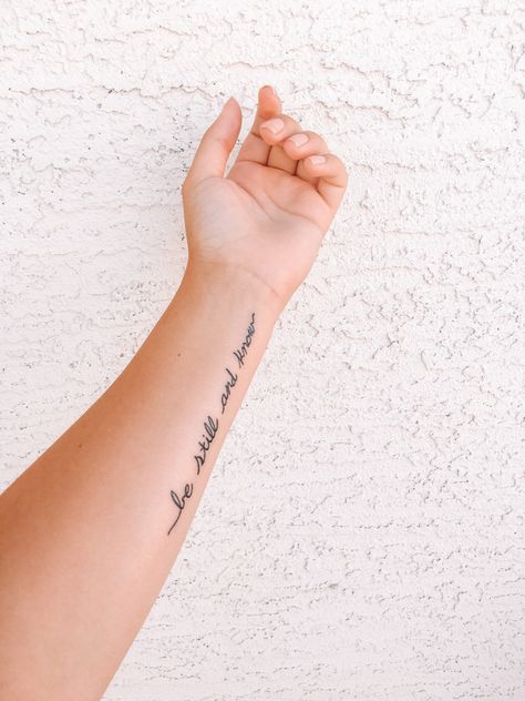 Cute Small Bible Verse Tattoos, Be Still And Know Tattoo With Flowers, Small Tattoos Biblical, Be Still My Soul Tattoo, Because He Lives Tattoo, Be Still And Know That I Am God Tattoo, Be Still Tattoo Font, Peace Be Still Tattoo, Bible Verse Tattoos For Women On Arm