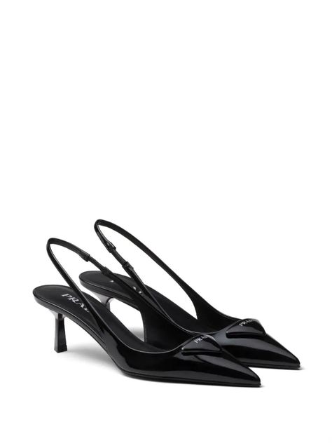 logo-plaque slingback pumps Prada's slingback pumps honour the Italian brand's minimalist design sensibility. Set on a mid heel, this black brushed-leather pair is solely decorated with the house's iconic triangle logo. Designer Sling Back Heels, Prada Stilettos, Prada Kitten Heels, Black Pointed Heels, Pointed High Heels, Prada Shoes Heels, Prada Triangle, Heels Designer, Vintage Prada