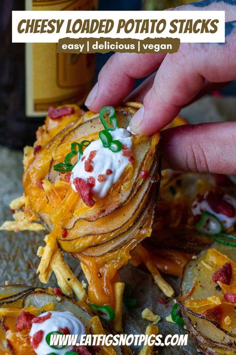 These delectable Cheesy Vegan Loaded Potato Stacks are the mini version of a loaded baked potato. Creamy vegan cheddar cheese is nestled between layers of thinly sliced potatoes then drizzled with melted butter and baked to golden, crispy perfection! Top the cheesy stacks with classic loaded baked potato toppings – sour cream, bac’n bits, and chives! Serve as fun, party appetizer or delicious side dish! Easy | Delicious | Vegan Baked Potato Toppings, Vegan Cheddar Cheese, Potato Stacks, Vegan Party Food, Loaded Baked Potato, Potato Toppings, Vegan Cheddar, Vegan Sour Cream, Loaded Potato