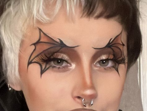 Graphic Eyebrows, Bat Inspired Makeup, Mythical Creature Makeup, Bat Makeup Halloween, Fangs Makeup, Bat Eyeliner, Bat Makeup, Goth Eye Makeup, Funky Makeup