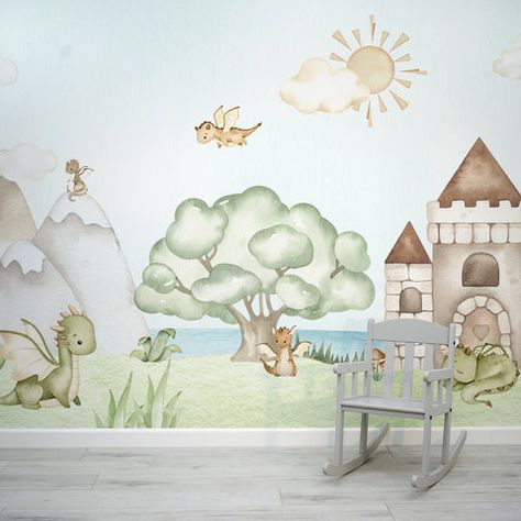 Watch the magical land of Lancelot come to life on your nursery wall! Soar with dragons, explore mountain tops, and discover castles as you drift away into a dreamy, soft watercolour world. Perfect for adding a touch of magic to any child's space! Child Wall Art, Baby Dragon Wallpaper, Fantasy Nursery Theme, Storybook Dragon, Nursery Wallpaper Ideas, Medieval Nursery, Fairytale Dragon, Fairy Tale Nursery, Fantasy Nursery