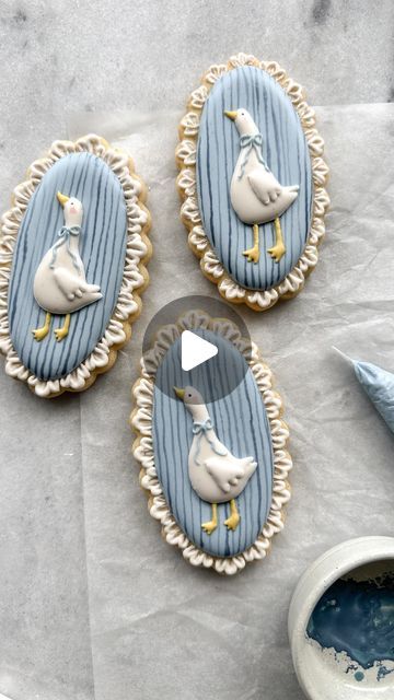 Emily Loggans on Instagram: "Pretty little geese for a tea party baby shower for my sissie ☕️ I love the vintage aesthetic of these. Check my stories for more pictures of this set and the tables! 🤍  #cookiedecoratingvideo #sugarcookieart #sugarcookiedecorating #royalicingcookie #cookieartist #cookiedecorating #designercookies #goose" Goose Cookies Decorated, Mother Goose Cookies, Silly Goose Baby Shower Decor, One Silly Goose Birthday Cookies, 1 Silly Goose Birthday, One Silly Goose Cookies, Silly Goose Cake, Classy Baby Shower Themes, Goose Baby Shower Theme