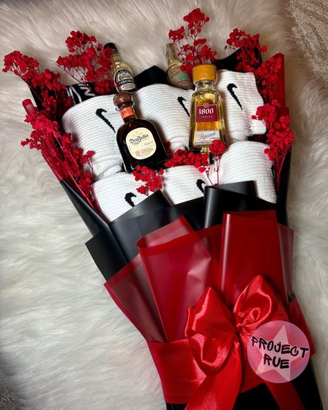 🍾🧦 Bouquets aren’t just for flowers—check out this custom “Bouquet for Him!”🌹✨ Featuring mini liquor bottles, Nike socks, Nike briefs, and a touch of red baby’s breath, this unique gift is the perfect way to celebrate in style. Whether it’s for birthdays, anniversaries, or just because, we can create a custom bouquet tailored to his favorites! 🎉🍷 Bouquets can be customized for any theme, occasion, or even characters! 🌟 Ready to create something unforgettable? DM us to design your own custom ... Bouquet For Him, Socks Nike, Mini Liquor Bottles, Custom Bouquet, Baby S Breath, Nike Socks, Red Baby, Liquor Bottles, Tequila