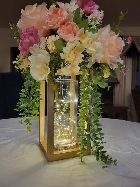 Center Piece For Quinceañera Table, Quinceñera Table Decoration Ideas, Rustic Quinceanera Centerpieces, Enchanted Forest Flower Arrangement, Diy Centerpieces For Quinceanera, Quince Centerpieces Ideas, Quince Decorations Centerpieces, Simple Quince Centerpieces, Quinceanera Centerpiece Ideas