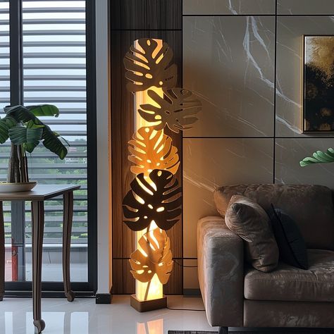 Illuminate your living space with this exquisite Monstera-inspired corner lamp. The sleek frame, adorned with intricate monstera leaf patterns, casts beautiful shadows, creating a serene oasis. The soft, warm LED glow offers a cozy ambiance, perfect for relaxing evenings. With a sturdy base and adjustable height, this lamp enhances any corner with botanical charm and contemporary style. Conceptual AI Art Follow @ecosapiens for more! Corner Lamp, Leaf Patterns, Cozy Ambiance, Nature Inspired Design, Monstera Leaf, Leaf Pattern, Nature Inspired, Contemporary Style, Home Interior Design