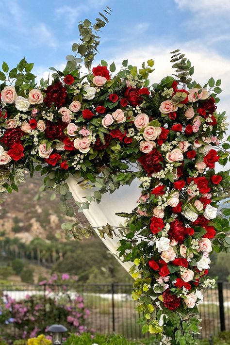 That gorgeous wedding arch could be absolutely stunning for your wedding. I love this idea for making a statement. Keep it to your wedding inspiration. Red And Blush Wedding Flowers, Red Blush White Wedding, Crimson Red And White Wedding, Red Pink And White Wedding Flowers, Red Blush Gold Wedding, Red White Blush Wedding Flowers, Rose Garden Theme Wedding, Burgundy And Red Wedding, Red Wedding Mandap