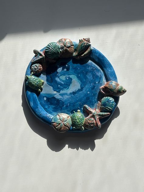 Cute ocean inspired jewelry holder, perfect for earrings or bracelets. All handmade and hand painted. Ocean Ceramics, Jewelry Organizer Ceramics, Clay Jewelry Holder, Ocean Trinkets, Ceramic Jewelry Holder, Clay Jewellery Holder, 4h Projects, Octopus Jewelry, Clay Bracelets