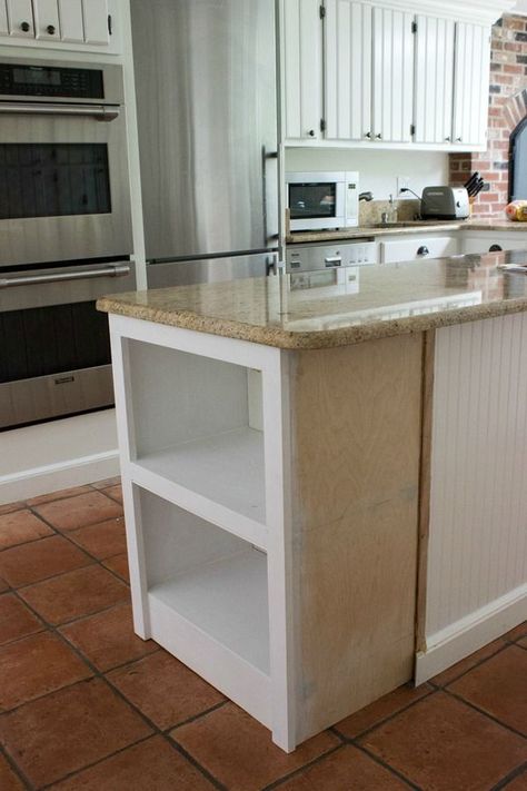 Microwave Shelf - the kitchen island was lengthened and a shelf was added to make room for the microwave. This is a brilliant use of space - via Driven by Decor Peninsula Base Cabinets, Adding Microwave To Cabinet, Add Shelves To Kitchen Island, Kitchen Island With Open Shelves On One Side, Microwave Shelf In Kitchen, Kitchen Island With Bookshelf, Kitchen Island Shelf, Kitchen Island With Microwave, Island With Microwave