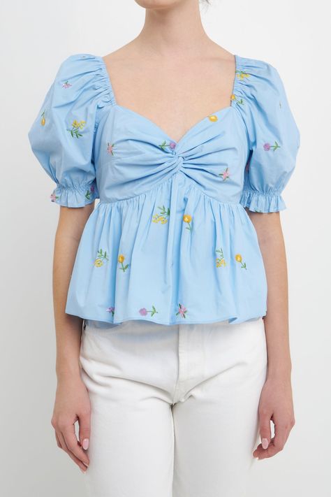 This top is perfect for adding a touch of spring to your wardrobe. The floral embroidery is delicate and feminine, while the puff sleeves add a touch of whimsy. It's perfect for pairing with jeans or shorts for a casual look. Floral embroidery Multi color embroidery Puff sleeve Lined Shell: 100% Cotton Lining: 80% Polyester 20% Cotton JJ1227T S Total length: 20", Bust: 34.50" Lilac : Height 5'10" / Bust 34 / Waist 24.5" / Hip 34.5" Short Kurtis For Jeans, Aesthetic Tops, Floral Embroidery Top, Embroidery Motif, Mughal Architecture, Color Embroidery, Fashion Top Outfits, English Factory, Embroidery Top