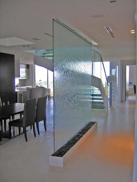 Water wall by Vertical River Designs Indoor Waterfall Wall, Glass Waterfall, Indoor Water Fountains, Indoor Waterfall, Waterfall Wall, Tabletop Fountain, Living Room Partition, Living Room Partition Design, Room Partition Designs