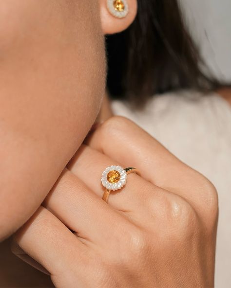 Daisies are not just found in the garden 🌼✨ Explore our delicate Daisy jewelry. Crafted with carved Mother of Pearl and natural Citrine to bring a touch of nature’s beauty to your everyday look. Seen here: Carved Daisy Stud Earrings Carved Daisy Ring in 18k Gold Vermeil Daisy Jewelry, Daisy Studs, Daisy Ring, Natural Citrine, In The Garden, Gold Vermeil, Everyday Look, Citrine, The Garden