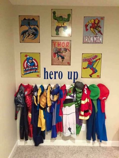 Hang up a coat rack for all the kids super hero costumes and put a decal saying “Hero Up” above it along with posters. Decorate wood letters with super hero paintings! So cool…you can also have customized superhero wall letters made! Hang up a wooden coat rack shelf for the costumes and out action figures … Toddler Playroom Organization, Small Kids Playrooms, Hero Up, Kids Playrooms, Superhero Bedroom, Basement Playroom, Boys Playroom, Superhero Room, Toddler Playroom