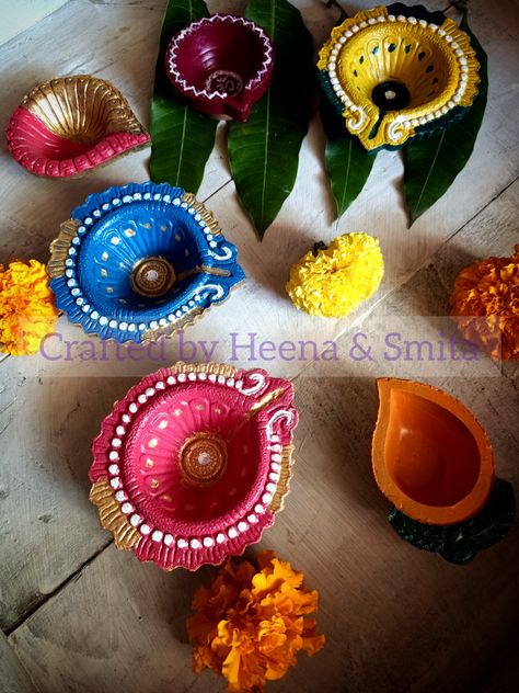 We painted these beautiful diyas for this Diwali and they were a hit amongst our neighborhood, friends and relatives... Do try these for your festivities... Paintings Acrylic Ideas, Diya Paintings Acrylic, Diya Paintings Acrylic Ideas, Diya Paintings For Diwali, Diya Paintings, Diya Decoration Ideas, Neighborhood Friends, Diya Decoration, Acrylic Ideas