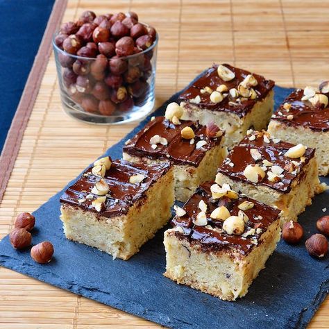 Chewy Hazelnut Bars - A soft and chewy cookie bar with plenty of crunchy nuts and a simple chocolate topping. Hazelnut Bars, Hazelnut Dessert, Newfoundland Recipes, Rock Recipes, Butter Tarts, Cookie Bar, Bar Cookies, Chocolate Topping, Chewy Cookie