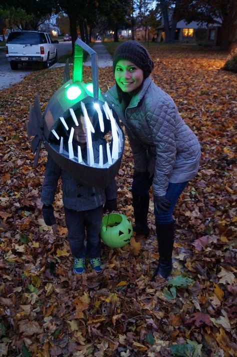 Such a cool 'out of the box' costume! Angler Fish Halloween Costume, Anglerfish Costume Diy, Diy Angler Fish Costume, Angler Fish Costume Diy, Anglerfish Costume, Fart Costume, Fish Costume Kids, Diy Fish Costume, Angler Fish Costume