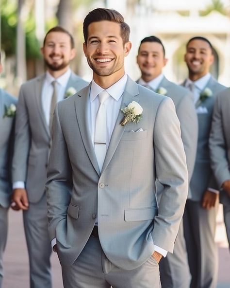 The grey groomsmen suit is a timeless and versatile choice, exuding elegance and sophistication. Its neutral color allows for effortless pairing with various styles and colors, ensuring a polished and refined look. Whether it's a traditional or modern wedding, the grey groomsmen suit is sure to make a stylish statement. Groom White Tie Grey Suit, Light Gray Groomsmen Suits Color Schemes, Grey Suit Wedding Groom & Groomsmen Suits, Dusty Blue Wedding Menswear, Groomsmen Light Grey Suit, Groom And Groomsmen Attire Grey, Light Gray Suit Wedding, Light Grey Groomsmen, Light Grey Suits Wedding