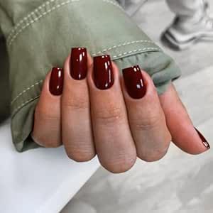 this product is a 24-piece set of wine red press-on nails with a short to medium square shape. They can be applied with adhesive or pressed on and are suitable for the fall and winter seasons. They are reusable and intended for women who desire a stylish and convenient manicure option. Short Coffin Acrylic Nails, Nails Short Medium, Burgundy Acrylic Nails, Coffin Acrylic Nails, Red Gel Nails, Dark Red Nails, Wine Nails, Press On Nails Short, Red Acrylic Nails