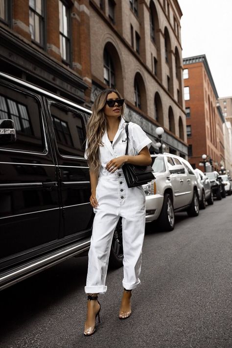 fashion blogger mia mia mine wearing a white jumpsuit from walmart. click through to see more of this utility fashion trend, how to wear a boilersuit, and denim jumpsuit outfits for women. #boilersuit #jumpsuit #whitedenim #walmartfashion White Utility Jumpsuit, Utility Jumpsuit Outfit, White Denim Jumpsuit, Maria Vizuete, Denim Jumpsuit Outfit, Mia Mia Mine, Chic Summer Dresses, Mia Mia, Comfy Jumpsuits