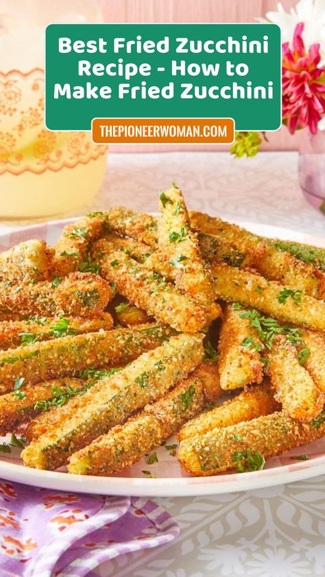 Transform summer zucchini into a crunchy snack recipe by coating it in breadcrumbs and parmesan, and frying it until golden brown and perfectly crisp. Fried Zucchini Recipe Easy Oven, Best Fried Zucchini Recipe, Healthy Fried Zucchini, Fried Zucchini Recipe Easy, Fried Zucchini Recipe, Fried Zucchini Flowers, Fried Zucchini Recipes, Zucchini Crisps, Fried Zucchini