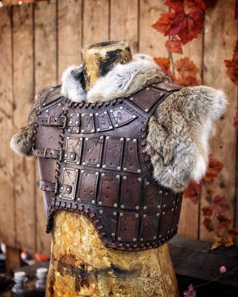 Look like a true warrior with our handmade leather studded armor. Featuring studded leather plates on the chest and an adjustable buckle system for a custom fit. The corded edge and distressed finish add an extra touch of epicness to this unique piece, and will make you feel like a real adventurer.  This leather studded armor is versatile and can be paired with a variety of outfits to create a unique look. Whether you're a cosplayer, larper, or collector, this armor will add an outstanding touch Leather Chest Plate, Studded Leather Armor Dnd, Leather Armor Fantasy, Studded Armor, Female Leather Armor, Leather Chest Armor, Fantasy Leather Armor, Viking Leather Armor, Studded Leather Armor