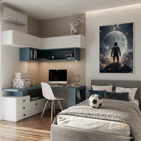 The bedroom is decorated with blue and white soccer ball-themed bedding, pictures of soccer players and fields, and a soccer ball on the bed and desk. The walls are painted white and the floor is covered in a light blue carpet. The overall impression is bright, airy, and soccer-themed. Boys Bedroom Ideas Teen, Boy Room Aesthetic, Small Boys Bedroom Ideas, Cool Boys Bedroom, Light Blue Carpet, Kids Room Ideas For Boys, Small Boys Room, Kids Room Boy, Boy Room Ideas