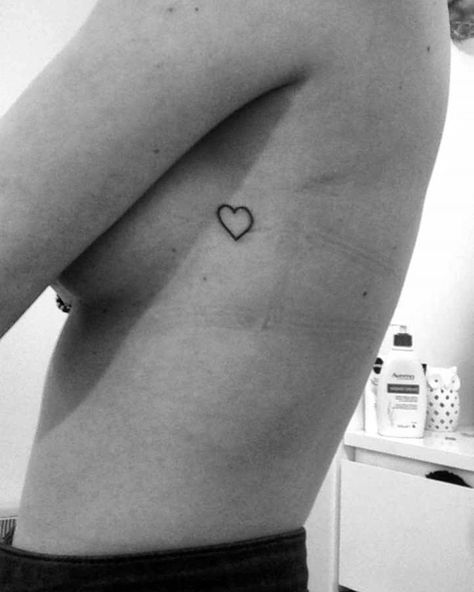 Red Heart Tattoo On Side Of Ribs, Heart On Ribcage Tattoo, Heart Tattoo On Side Of Ribs, Heart Tattoo On Ribs Cage, Heart Rib Cage Tattoo, Ratio Ideas Women, Heart Ribcage Tattoo, Heart Tattoo Ribcage, Heart Tattoo Thigh